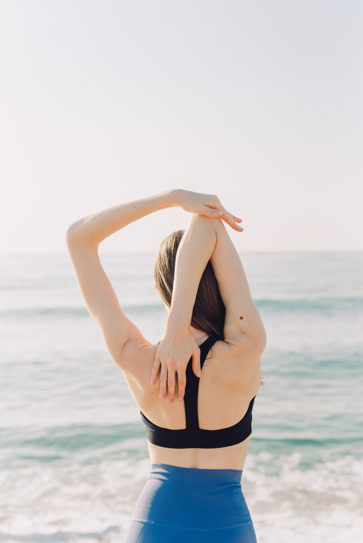 Back View of a Woman Stretching